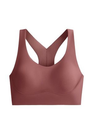 Mauve nahtloser Sport-BH mit breiten Schulterträgern und Racerback-Design, aus glattem, elastischem Stoff für Halt und Komfort.