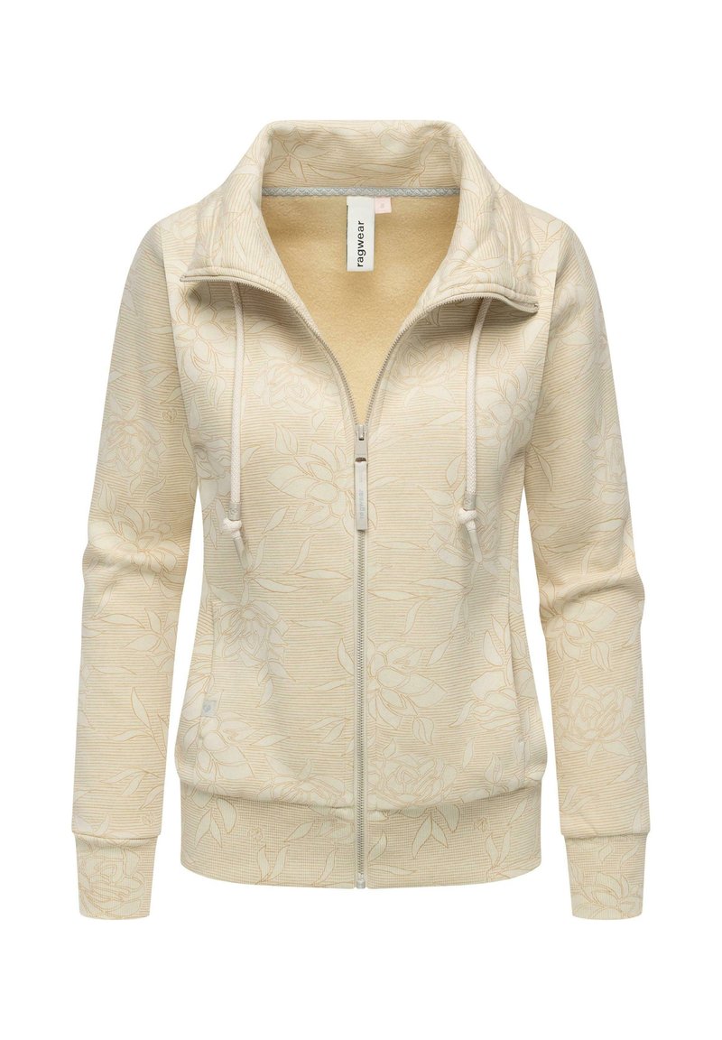 Giacca beige con zip, con un leggero motivo floreale, colletto alto, cordini e polsini e orlo a coste, presentata su sfondo bianco.