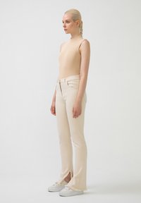 Touché Privé Nadrágok - beige