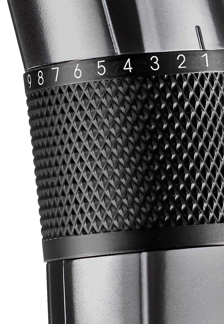 Objeto cilíndrico negro con un agarre texturizado que presenta patrones de diamante; una escala numérica recorre el borde superior en blanco.