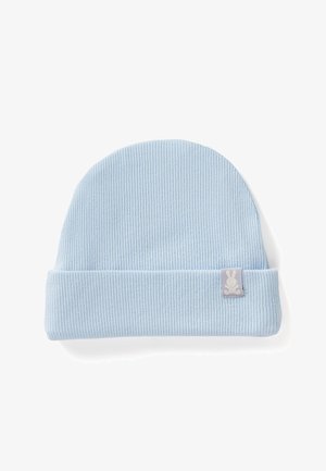 Cappellino a coste azzurro chiaro realizzato in materiale morbido, con risvolto e un piccolo logo a forma di coniglio su una toppa grigia.