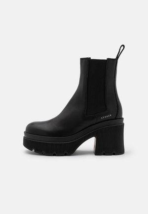 Bottines à talons hauts - black
