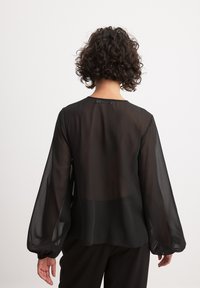 NA-KD TIE DETAIL BALLOON SLEEVE - Camicetta - black