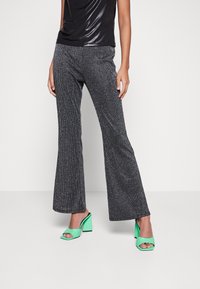 Monki Tygbyxor - black