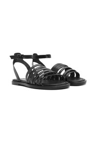 Sandales en cuir noir avec plusieurs brides horizontales, une sangle de cheville réglable, une semelle plate et un design simple adapté aux temps chauds.