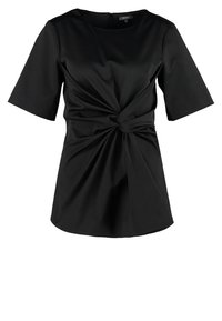 Černý top s krátkým rukávem vyrobený z hladké látky, s detailním uzlem ve výšce pasu a kulatým výstřihem.