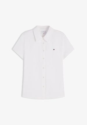 Biała koszula na krótki rękaw z guzikami, kołnierzykiem i małym logo Tommy Hilfiger na lewej piersi.