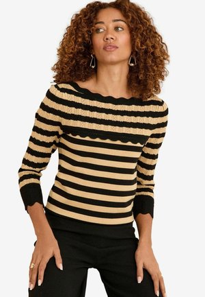 Pull en tricot rayé noir et beige, avec un col festonné et des manches trois-quarts. Motif texturé sur la partie supérieure.