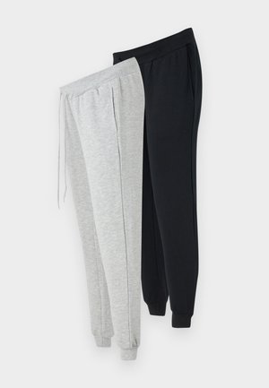 To par med joggebukser: en lys grå og en svart. Begge har elastisk midje, sidelommer og smalnede ermer. Blandingsmateriale av bomull.