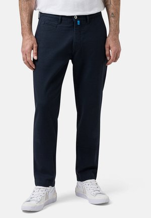 Navy blue cotton blend pants with a straight leg design, front pockets, and a contrasting light blue button detail at the waist.