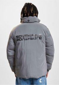 Southpole SOUTHPOLE HERREN PM233-012-1 BUBBLE NORTH-SOUTH 1.0 - Winterjacke - light blue reflective