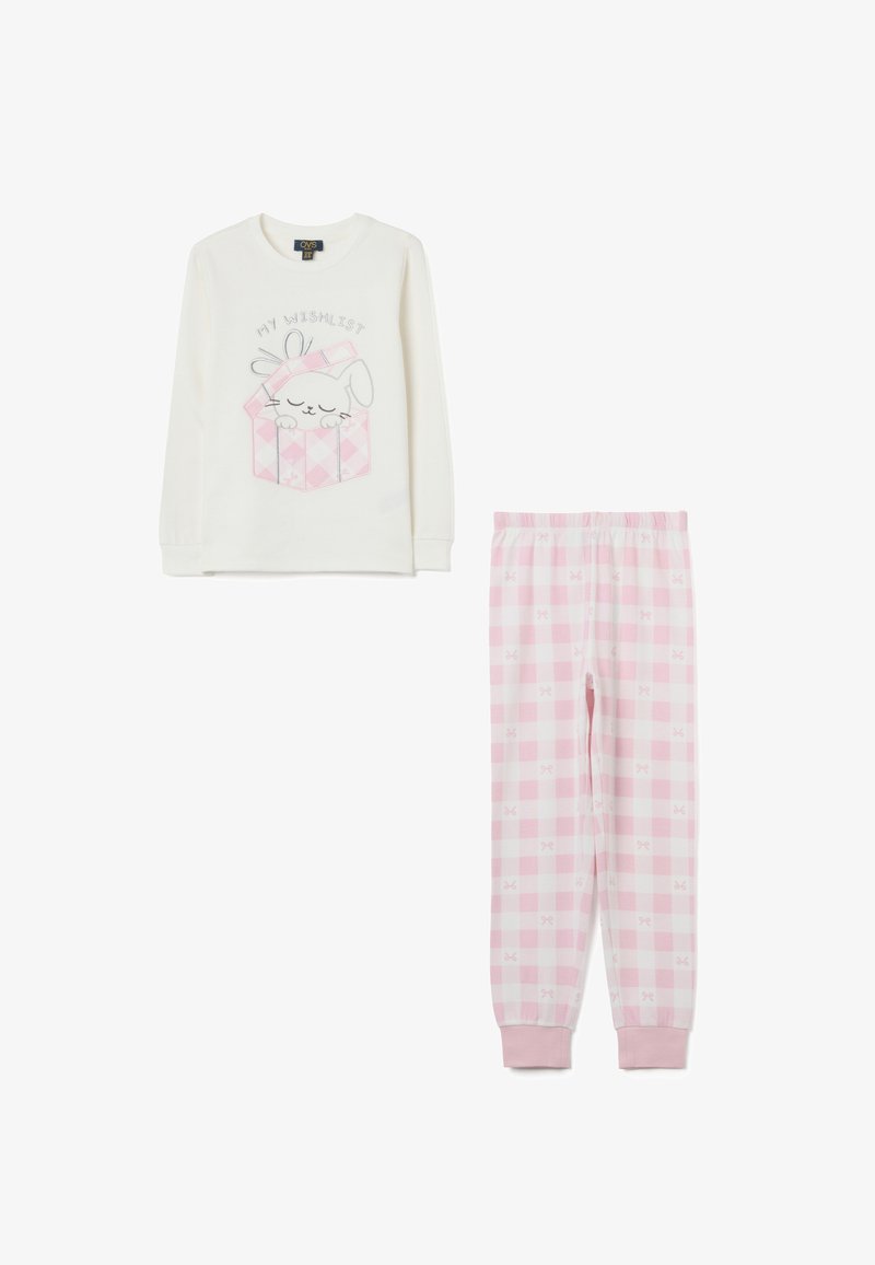Blusa de manga larga en color crema con un gráfico de un conejo y el texto "MI LISTA DE DESEOS", combinada con pantalones de pijama de cuadros rosas que presentan pequeños patrones de lazo.