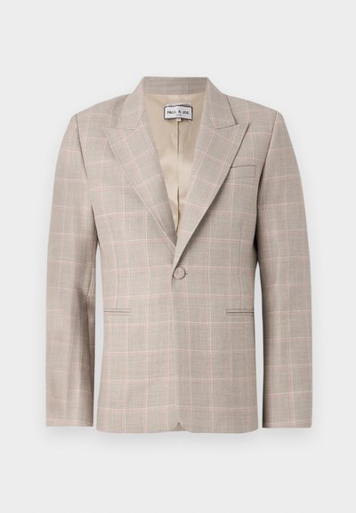 Jasnobeżowa marynarka z delikatnym wzorem w kratkę w odcieniach różu i szarości. Posiada klapy z wycięciem, dwie przednie kieszenie oraz zapięcie na pojedynczy guzik.