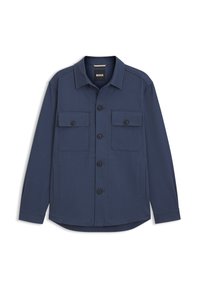 Tamsiai mėlynas palaidinės tipo švarkas su dviem priekinėmis kišenėmis, juodais mygtukais ir kampuotu atvartėliu. Pagamintas iš lygaus, tekstūruoto audinio.