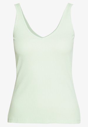 Světlé zelené žebrované tílko bez rukávů s výstřihem do V a přiléhavým střihem.