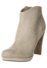 Beige suede ankle boot with a rounded toe, high heel, and a smooth finish. Features a side zipper and subtle stitching detail.