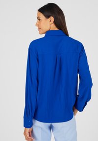 Damart UNI GAUFRÉ - Overhemdblouse - bleu