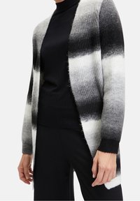 Cartoon Kofta - black