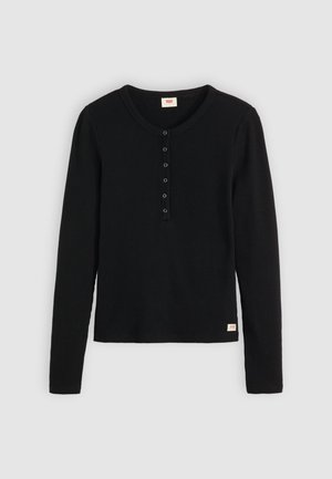 Black long-sleeve top made of ribbed fabric, featuring a round neckline and five buttons down the front. Small brand label at the hem.