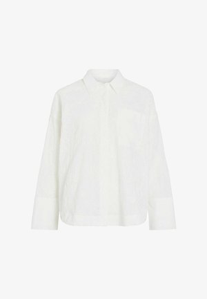 Valge pikkade varrukatega särk rinnatasku, terava krae, eesmine nööbiliist ja laiad mansetid, esitatud ühevärvilisel taustal.