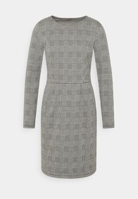 Robe à manches longues à motif à carreaux noir et blanc, avec un col rond et une silhouette ajustée avec un ourlet légèrement évasé.