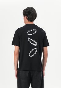 Karl Lagerfeld Jeans - MULTI RING TEE - T-shirt con stampa - black Immagine in miniatura 1
