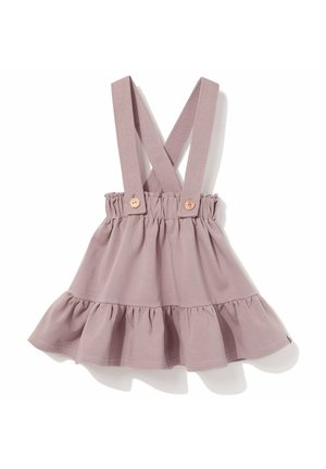 Pylisto-różowa spódniczka dla malucha z falbaną na dole i regulowanymi, krzyżującymi się na ramionach szelkami zapinanymi na drewniane guziki.
