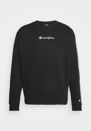 Felpa nera in misto cotone, con il logo bianco "Champion" sul petto e dettagli a contrasto lungo le maniche.