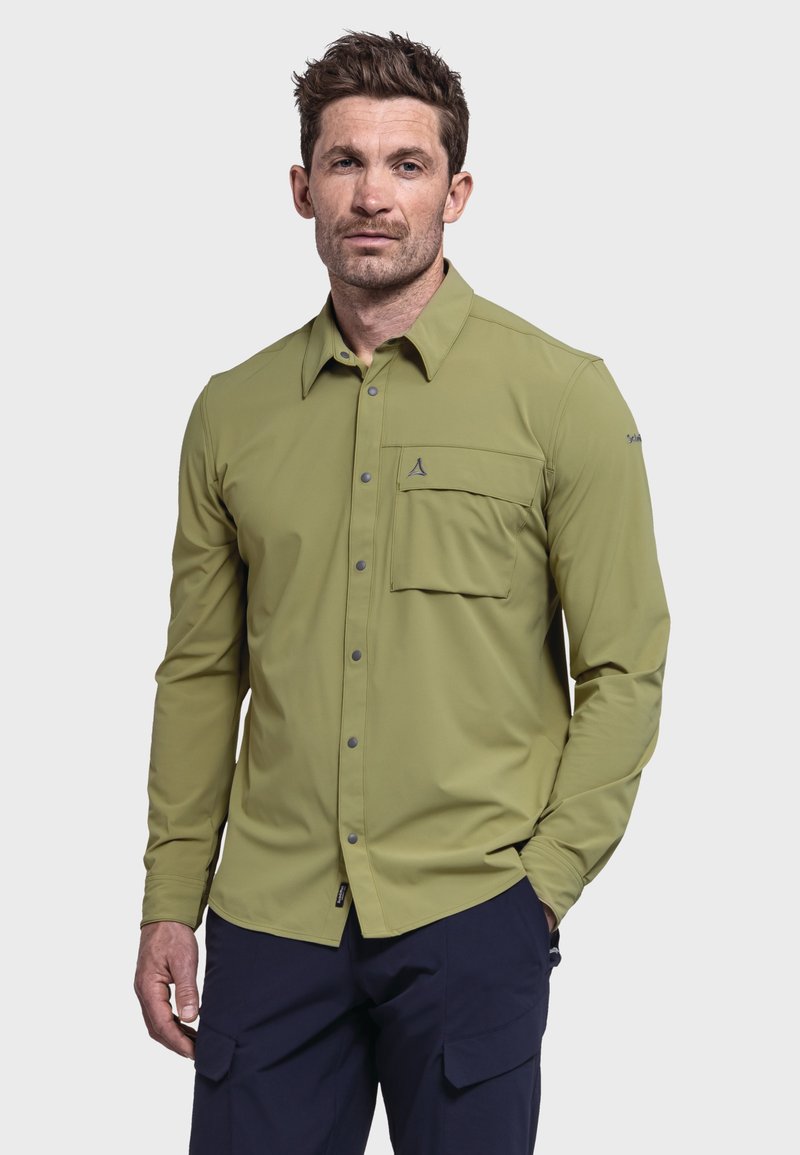 Langärmliges Shirt in olivgrün, aus glattem Stoff. Verfügt über eine Brusttasche und einen Button-Down-Kragen mit grauen Knöpfen.