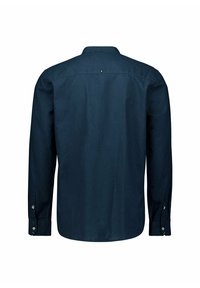 Marineblauwe blouse met lange mouwen, gemaakt van een gladde stof, met een button-down kraag, achterste schouderstuk en knopenmanchetten. Eenvoudig ontwerp, geen patroon.