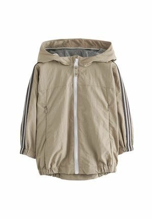 Light beige hooded jacket with a full zipper, elastic cuffs, and two side pockets. Dark gray stripes along the sleeves, lightweight fabric.
