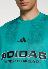 adidas Sportswear TIRO TEE - Marškinėliai su spaudiniu - pure teal/black