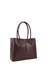 Bruine krokodillenembossed totebag met een gestructureerde vorm, twee stevige handgrepen en een gladde textuur. Geen extra versieringen.