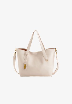 Cream, pebbled leather tote bag with two handles and a detachable shoulder strap. Features gold-tone hardware and a front tag.