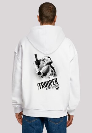 White hoodie featuring a black and gray graphic of a stormtrooper holding a blaster, with text reading "STORM TROOPER IMPERIAL FORCES."