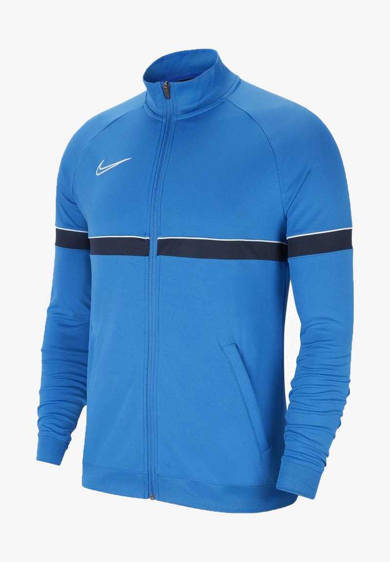 Nike Zip-Jacke in leuchtendem Blau, mit hohem Kragen, schwarzem horizontalem Streifen über der Brust und schmaler Passform mit langen Ärmeln.