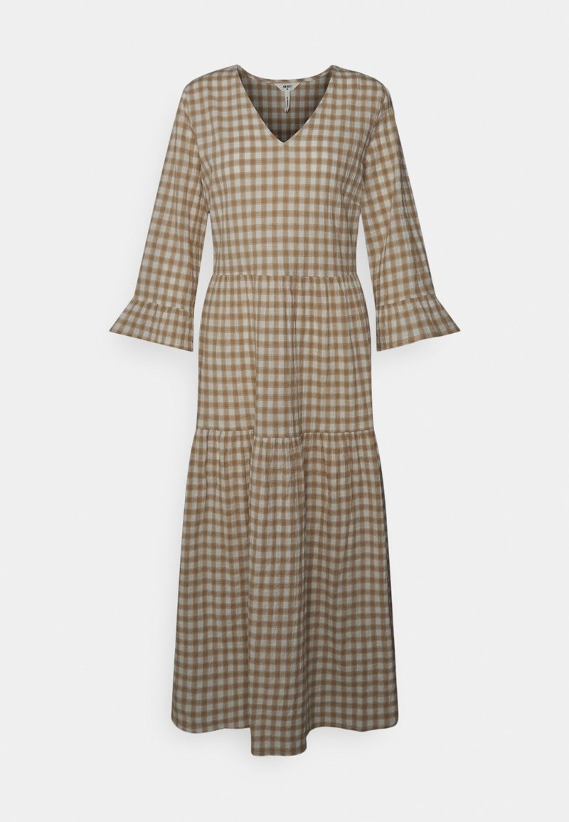 Ruskea ja valkoinen ruudullinen pitkä mekko, jossa on V-pääntie, kolmen neljänneksen hihat ja levenevät hihansuut. Mekko on kerroksellinen ja valmistettu kevyestä kankaasta.