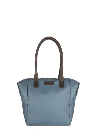 Blaue Handtasche mit Struktur, dunklen braunen Griffen und einem oberen Reißverschluss, mit einem kleinen rechteckigen Markenetikett auf der Vorderseite.