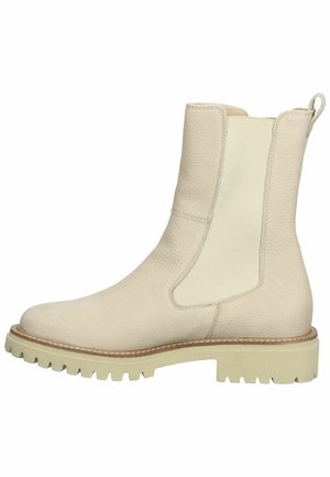 Stivaletto in pelle beige chiaro con pannelli laterali elastici, suola in gomma con tacchetti e linguetta sul retro per una facile indossabilità. Finitura testurizzata.