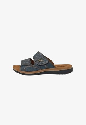 Sandalia plana de cuero azul marino para hombre con dos correas ajustables de Velcro y suela acolchada marrón.