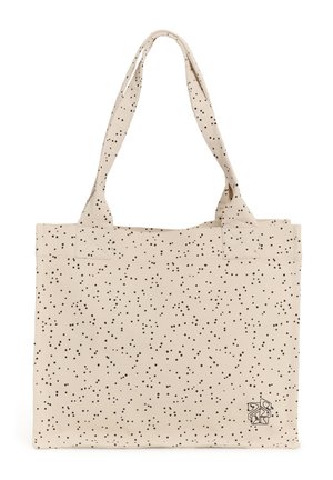 Geantă tote din pânză bej cu buline negre împrăștiate și două barete pentru umăr, având un mic logo abstract negru în partea de jos, dreapta.