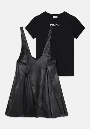 Black leather dress with a deep neckline and pleated skirt, paired with a fitted black cotton T-shirt featuring "PINKO" logo in white.