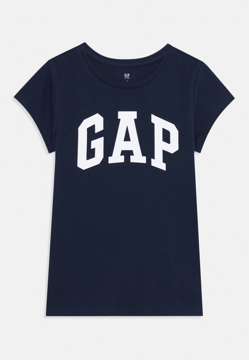 T-shirt en coton bleu marine à manches courtes, avec un logo "GAP" blanc sur le devant dans une police audacieuse et arrondie.