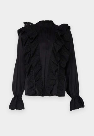 Juoda bliuskutė su raukiniais priekyje ir rankovėse, pagaminta iš lengvos medžiagos, su sudėtingais siuvinėjimais ir aukštu kaklu.