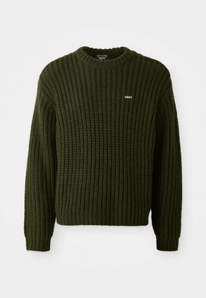 Temnozeleni pleteni pulover s okroglim izrezom, rebrastimi manšetami in robom. Na sprednji strani ima majhen bel logotip "OBEY".