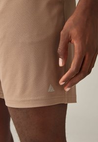 Next TEXTURED ACTIVE  REGULAR FIT - Shorts - stone