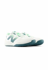 White athletic shoes with teal accents, featuring a textured surface, prominent "N" logo, and a grip-patterned sole, secured with laces.