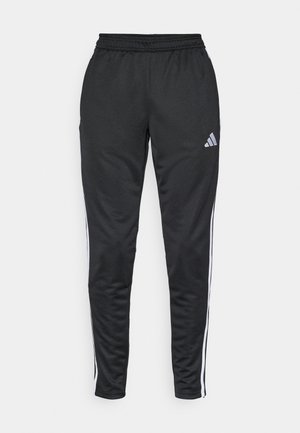 Black athletic pants featuring a lightweight fabric, slim fit, elastic waistband, and white side stripes with a small logo on the upper thigh.