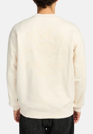 Cream-colored sweatshirt with embossed logo and text on the back, crew neckline, and ribbed cuffs and hem. Soft cotton material.