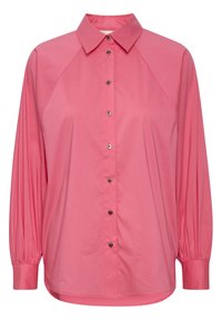 Chemise rose à boutons avec col, manches longues en raglan et patte de boutonnage avec des boutons argentés. Tissu lisse avec un léger éclat.